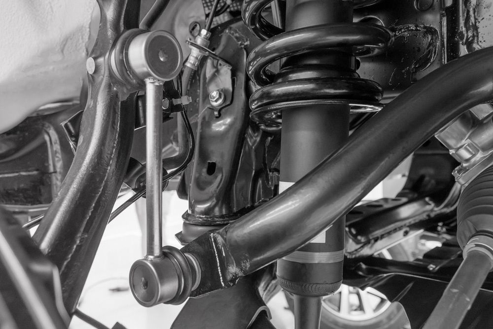A Black and White Photo of A Suspension System on A Car — S&A Automotive Repairs Pty Ltd In Yarrawonga, VIC