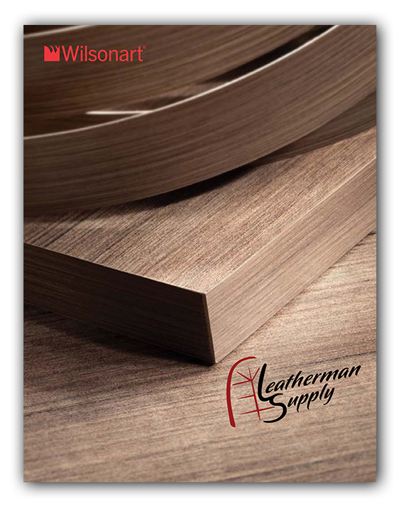 Close-up of wood flooring planks with Wilsonart and Heathman Supply logos