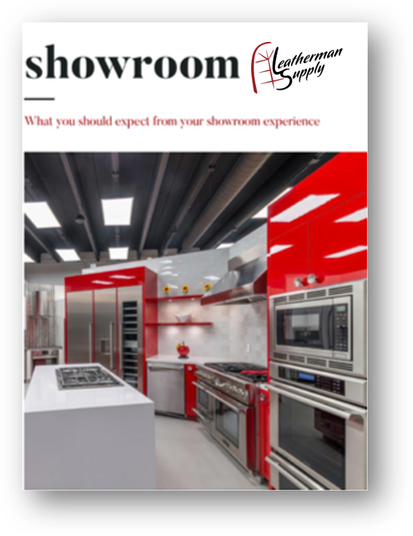 Modern red-and-stainless steel showroom kitchen with appliances and island display