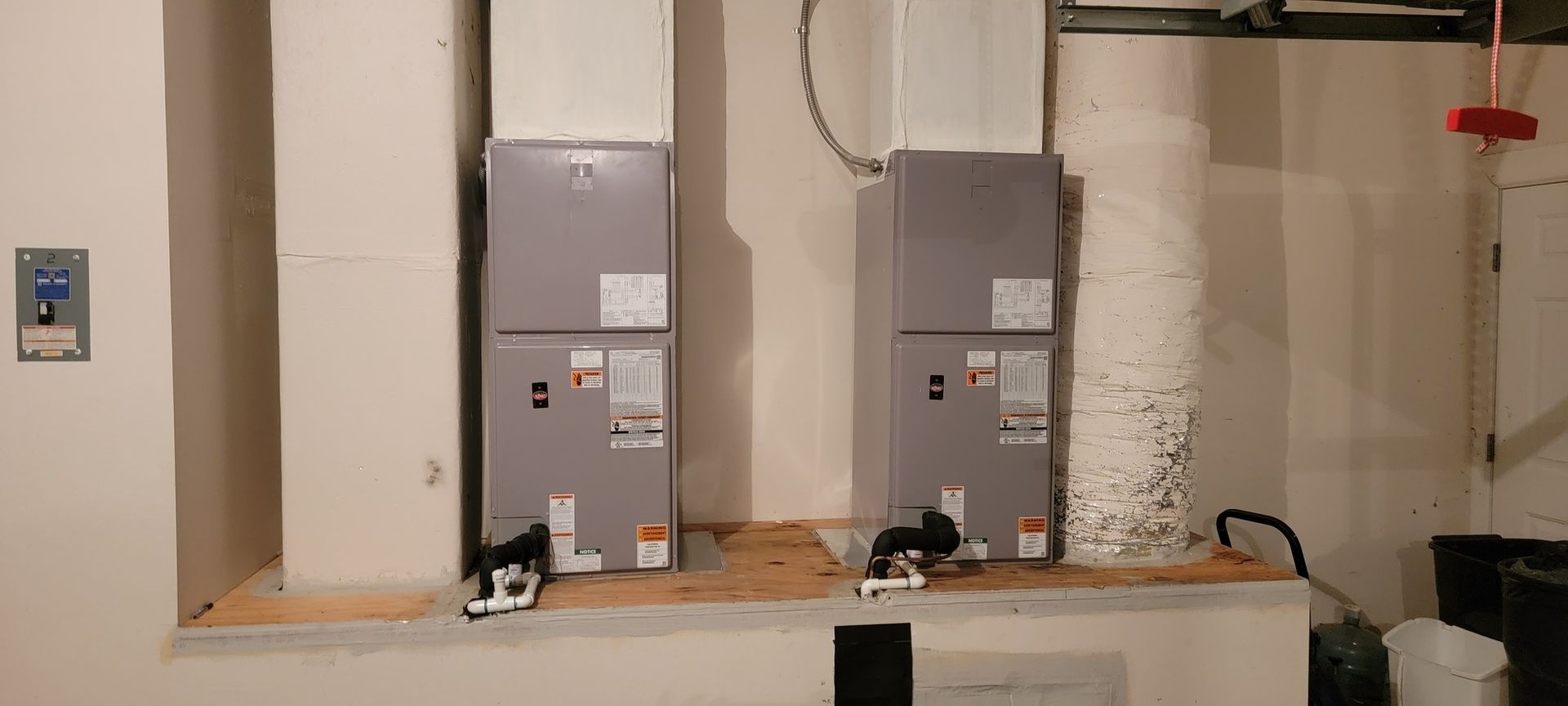 A couple of boxes sitting on top of each other in a room.