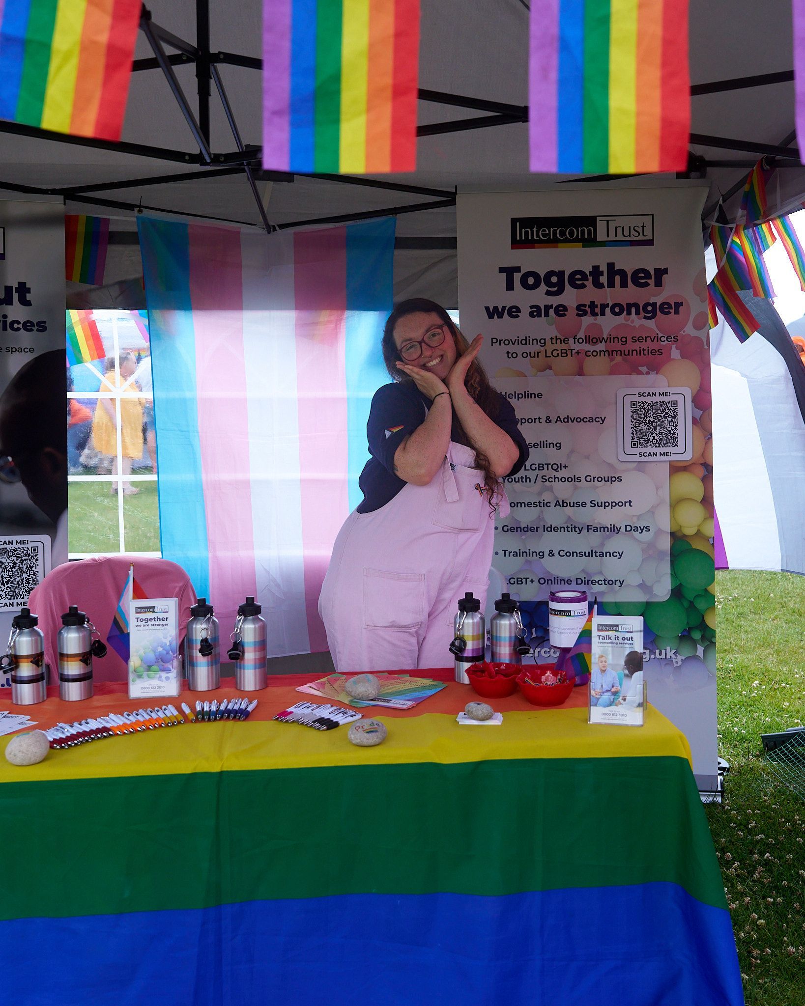 A female with pink dungarees at intercom trust