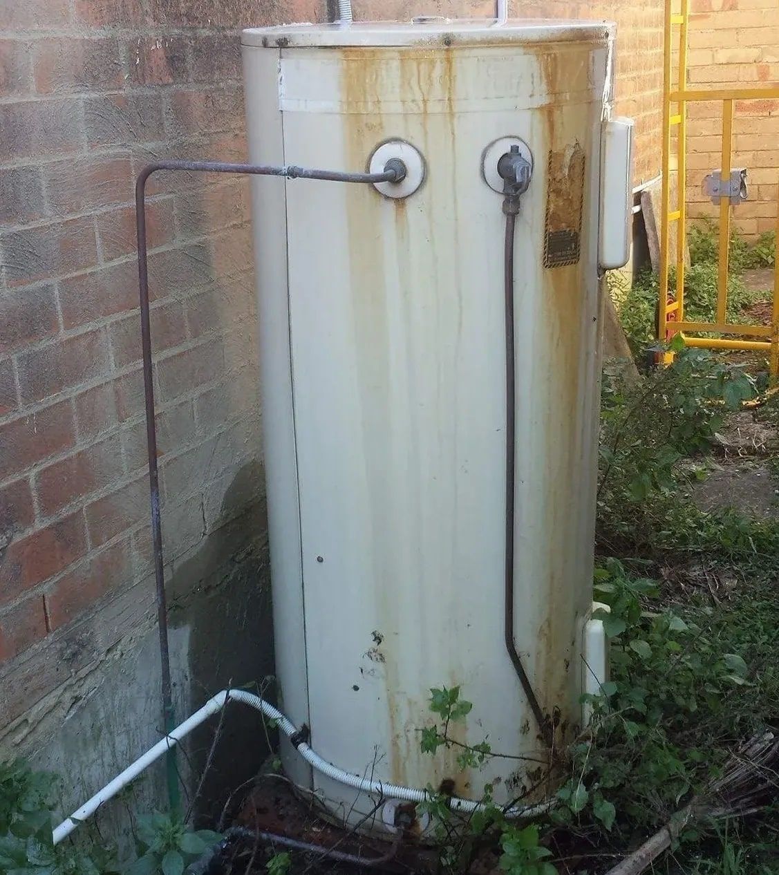 Rusty and old hot water tank