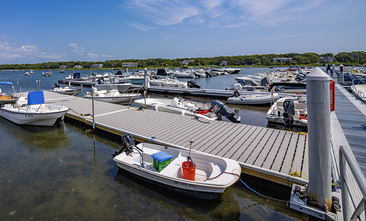 An aerial view of a body of water with boats in it