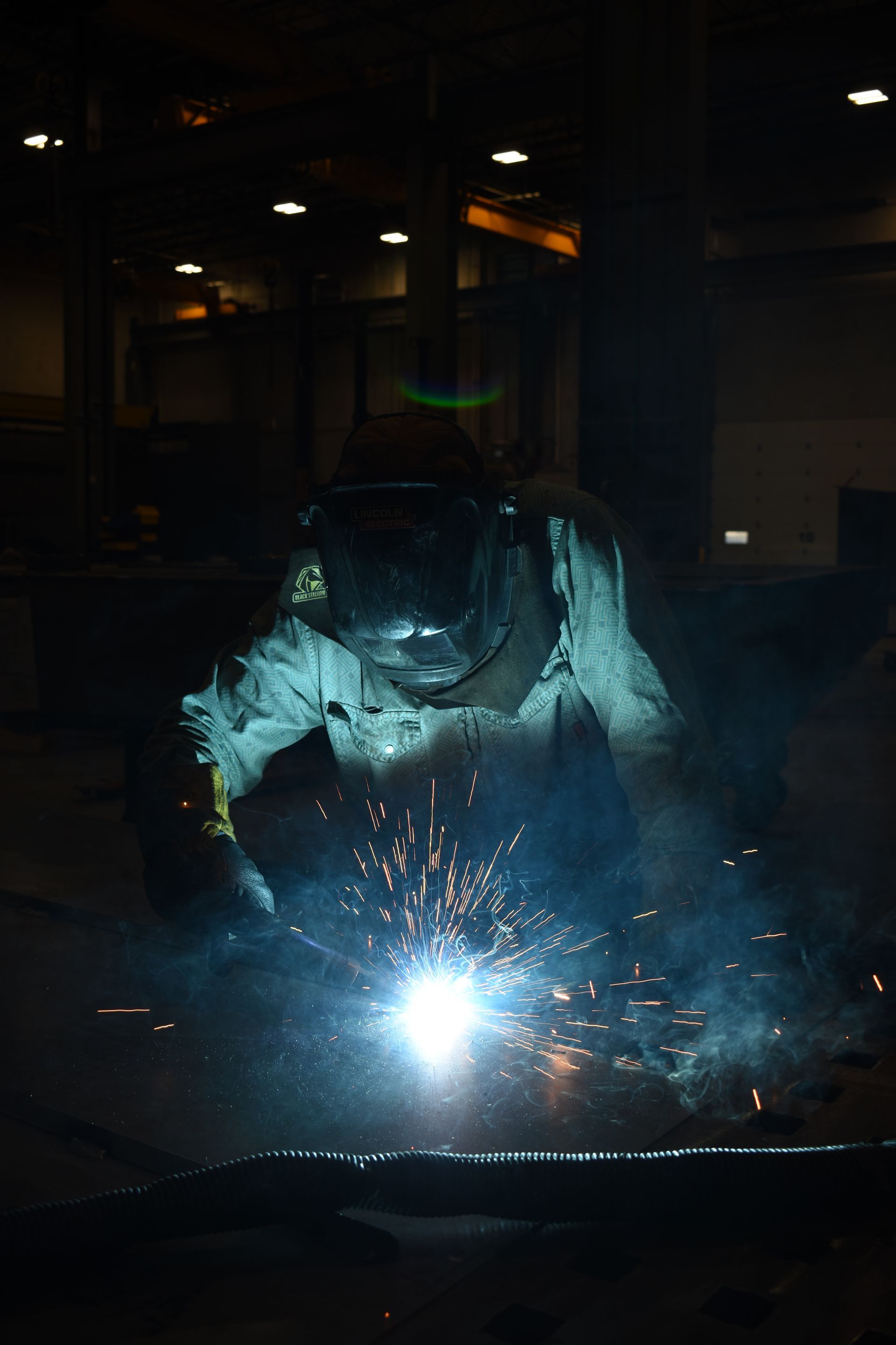 View of a controlled welding environment designed for large-scale industrial fabrication.