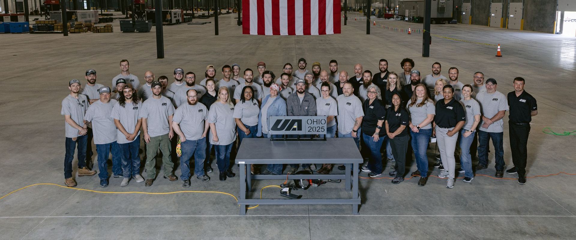 The official UA Ohio grand opening team photo, celebrating the expansion of manufacturing capabilities in Union, OH.