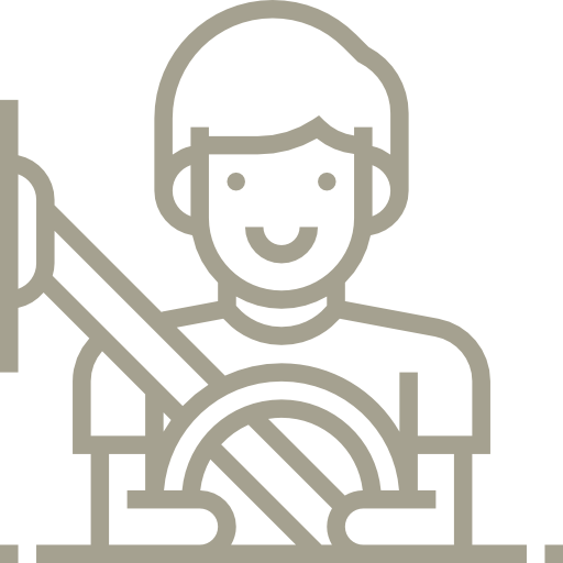 A man is driving a car with a seat belt on.