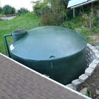 Green Water Tank — Redding, CA — Dino’s Rain Gutters Green Water Tank — Redding, CA — Dino’s Rain Gutters