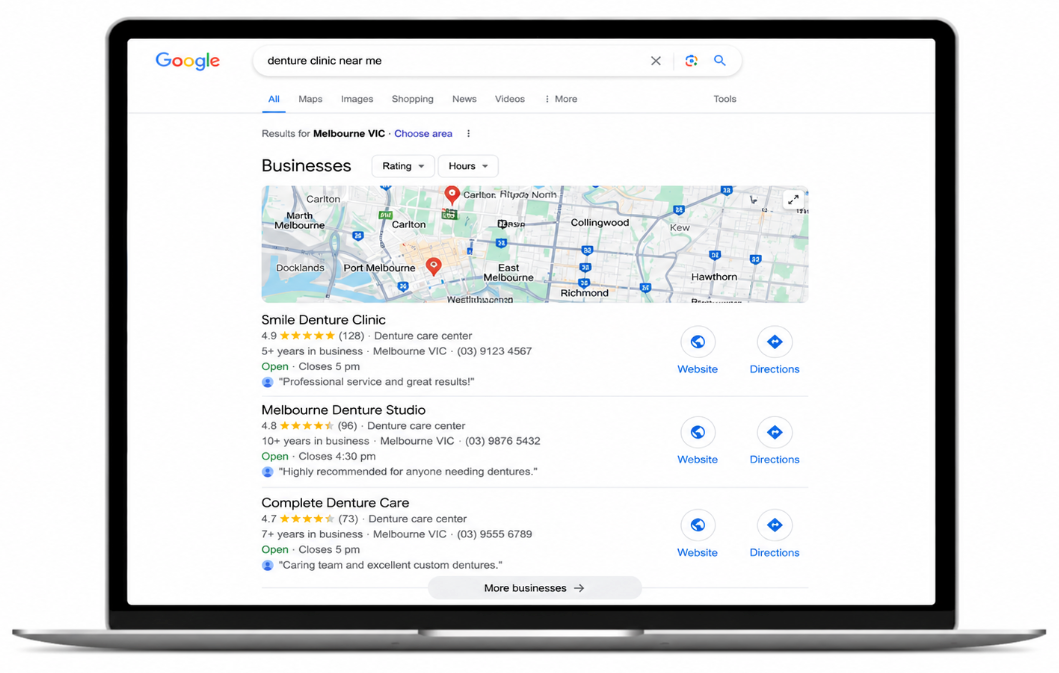 Laptop displaying Google Maps search results for denture clinic near me and a map on a white scree.