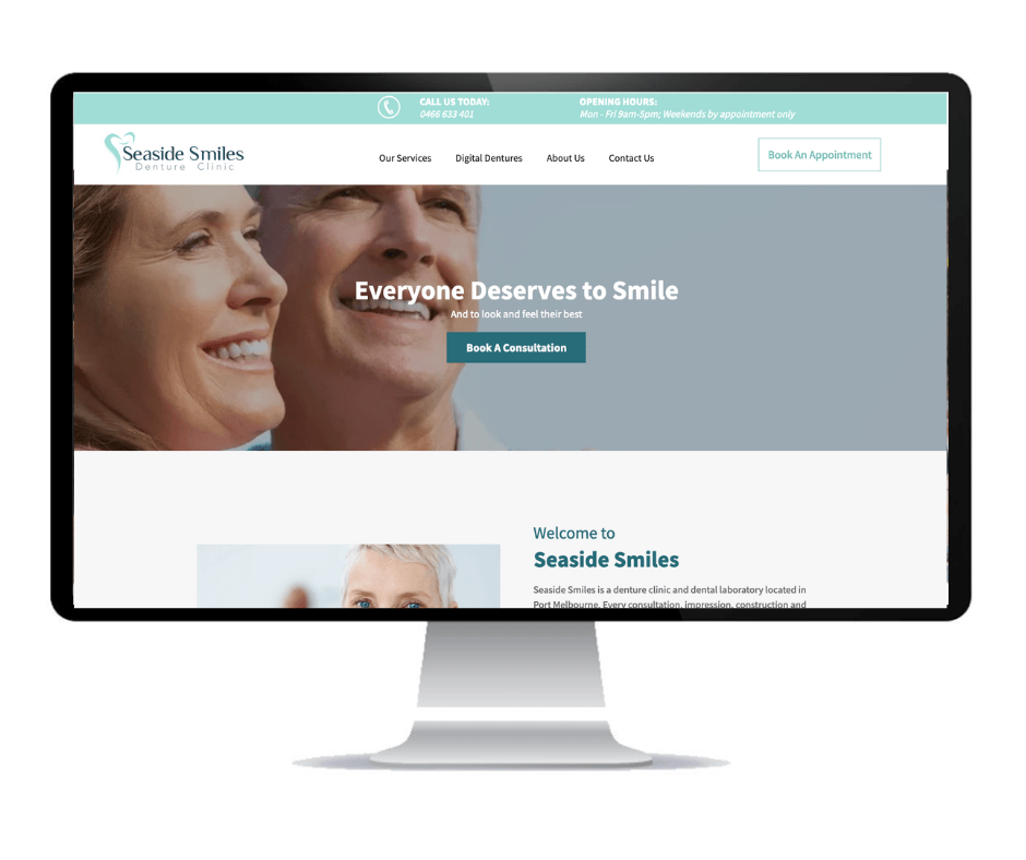 Desktop monitor showing a dental website with a smiling woman and the headline “Everyone Deserves to Smile.”