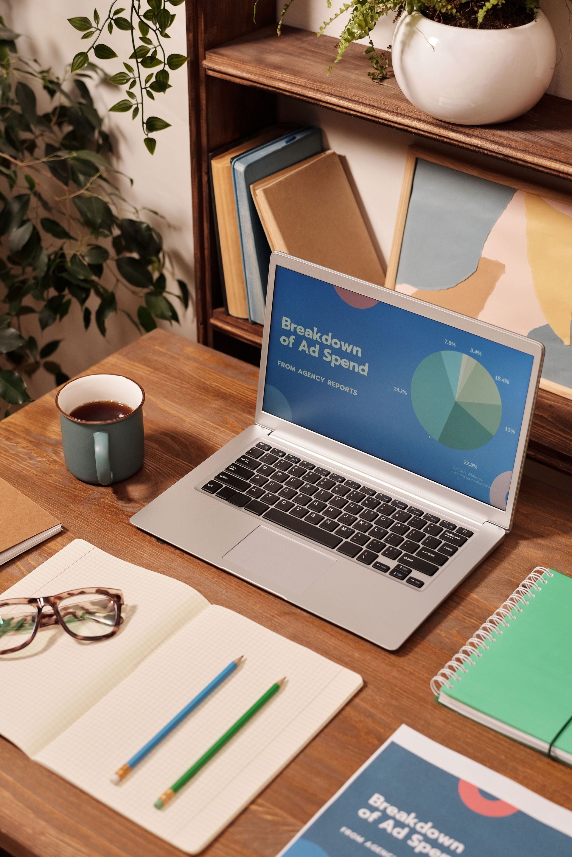 image of a laptop with social icons around it to visualise how business web directories work