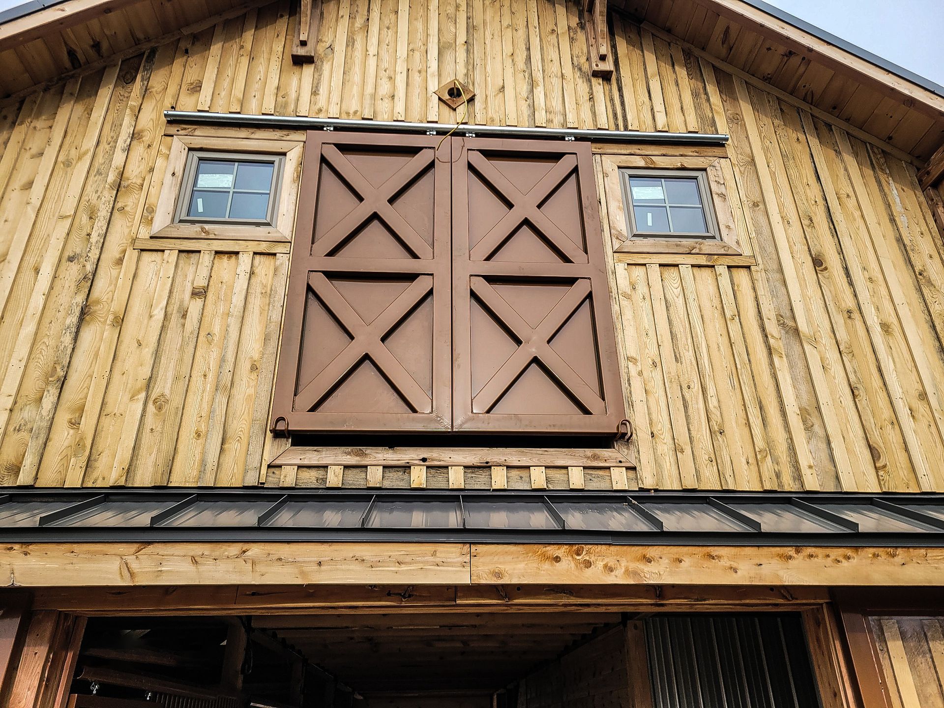 Hand Built Custom Sliding Windows for Horse Barn