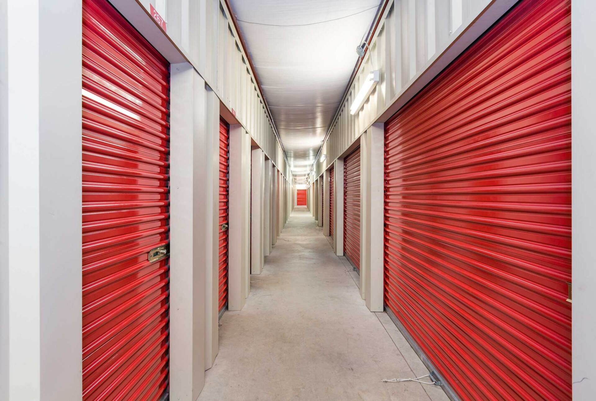 Self Storage Units with Red Rolling Doors — Corpus Christi, TX — Crosstown Mini Storage