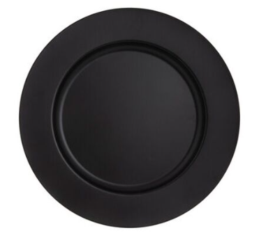 A black plate is sitting on a white surface