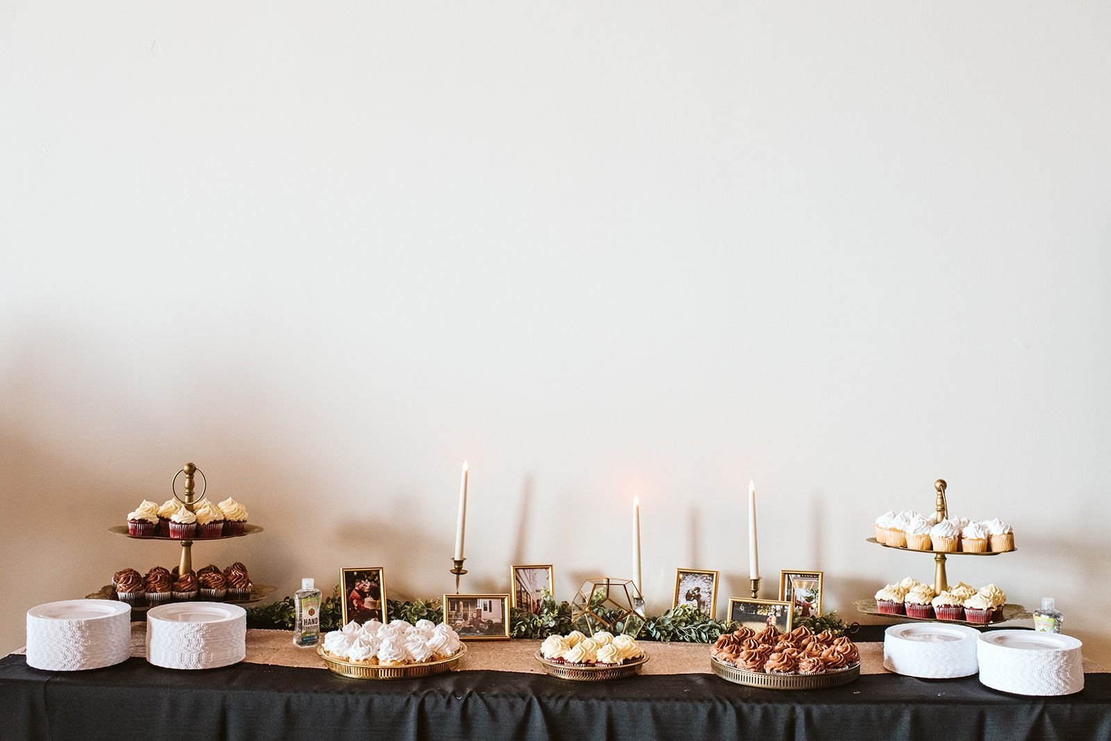 There is a table with a lot of food on it.