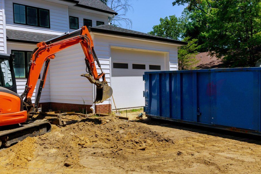 An Excavator is Digging a Hole in Front of a House — Bennettron Demex in Ocean Shores, NSW