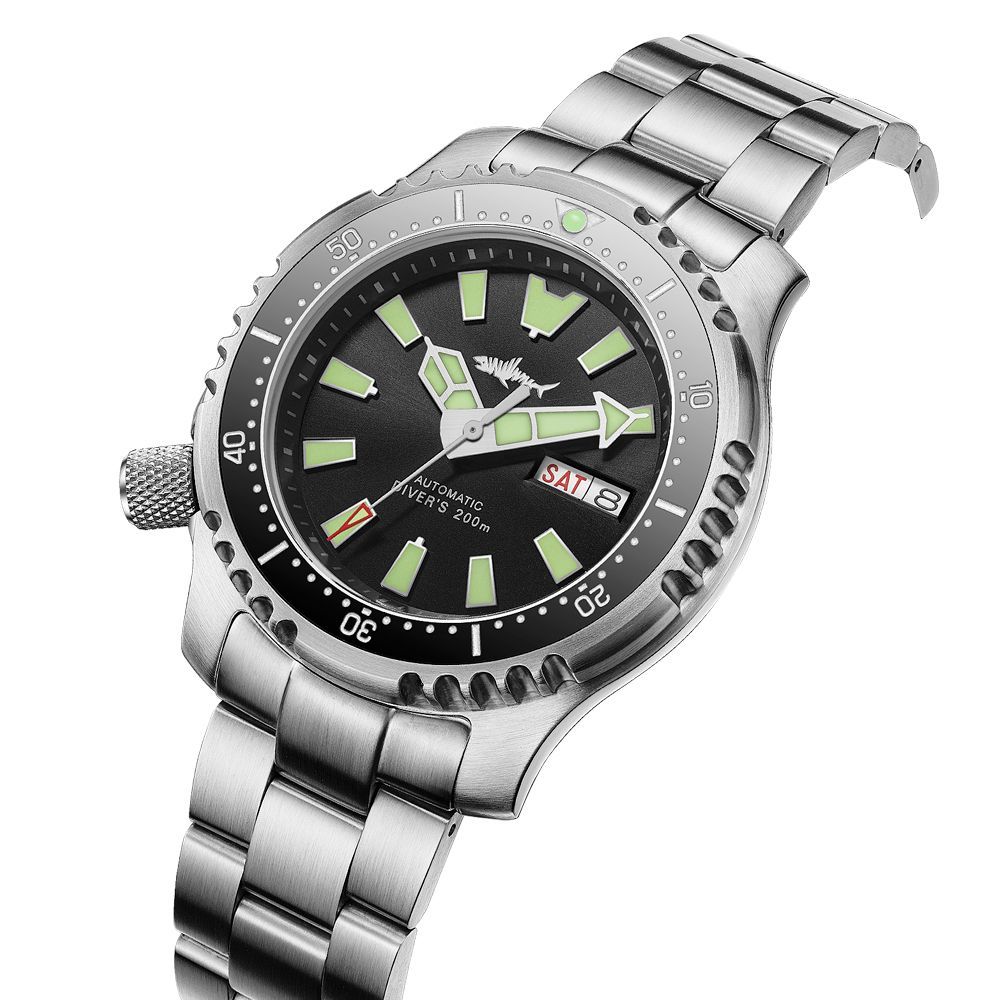 A silver watch with a black face and green hands on a white background.