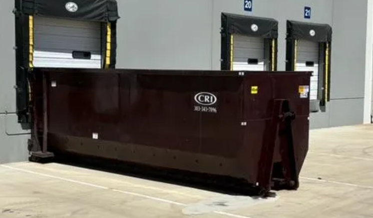 Roll-off dumpster rental containers staged for delivery Roll-off dumpster rental containers staged for delivery