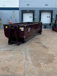 Roll-off dumpster placed at commercial loading docks. Roll-off dumpster placed at commercial loading docks.