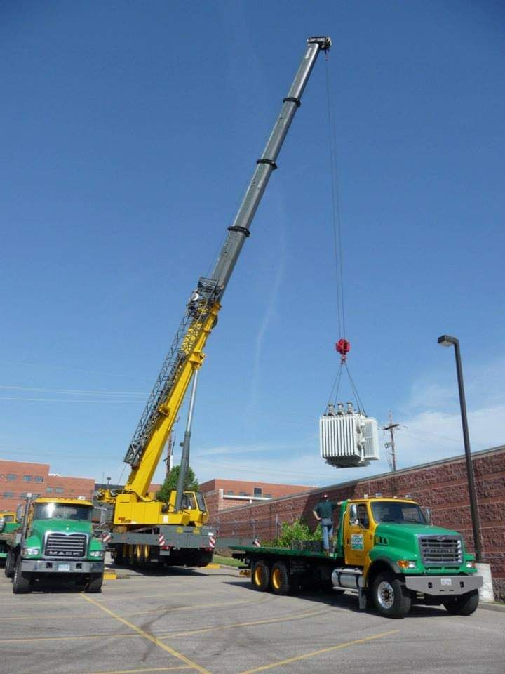 Crane Lifting an Object — Akron, OH — Frank Lucco Company Crane Lifting an Object — Akron, OH — Frank Lucco Company