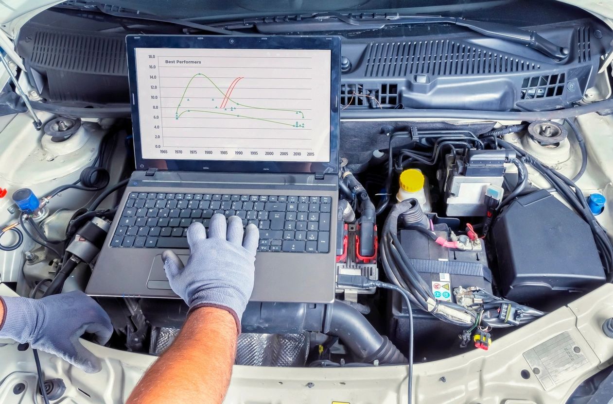 White Car Status in Laptop - Lubbock, TX - Wrench 'Em Auto & Diesel Repair