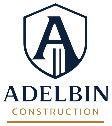Adelbin Construction logo with navy shield and stylized A above company name on a light background