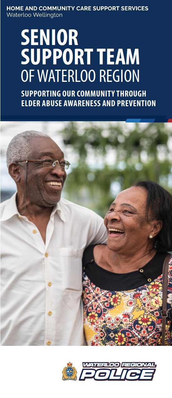 A man and a woman are standing next to each other and smiling.