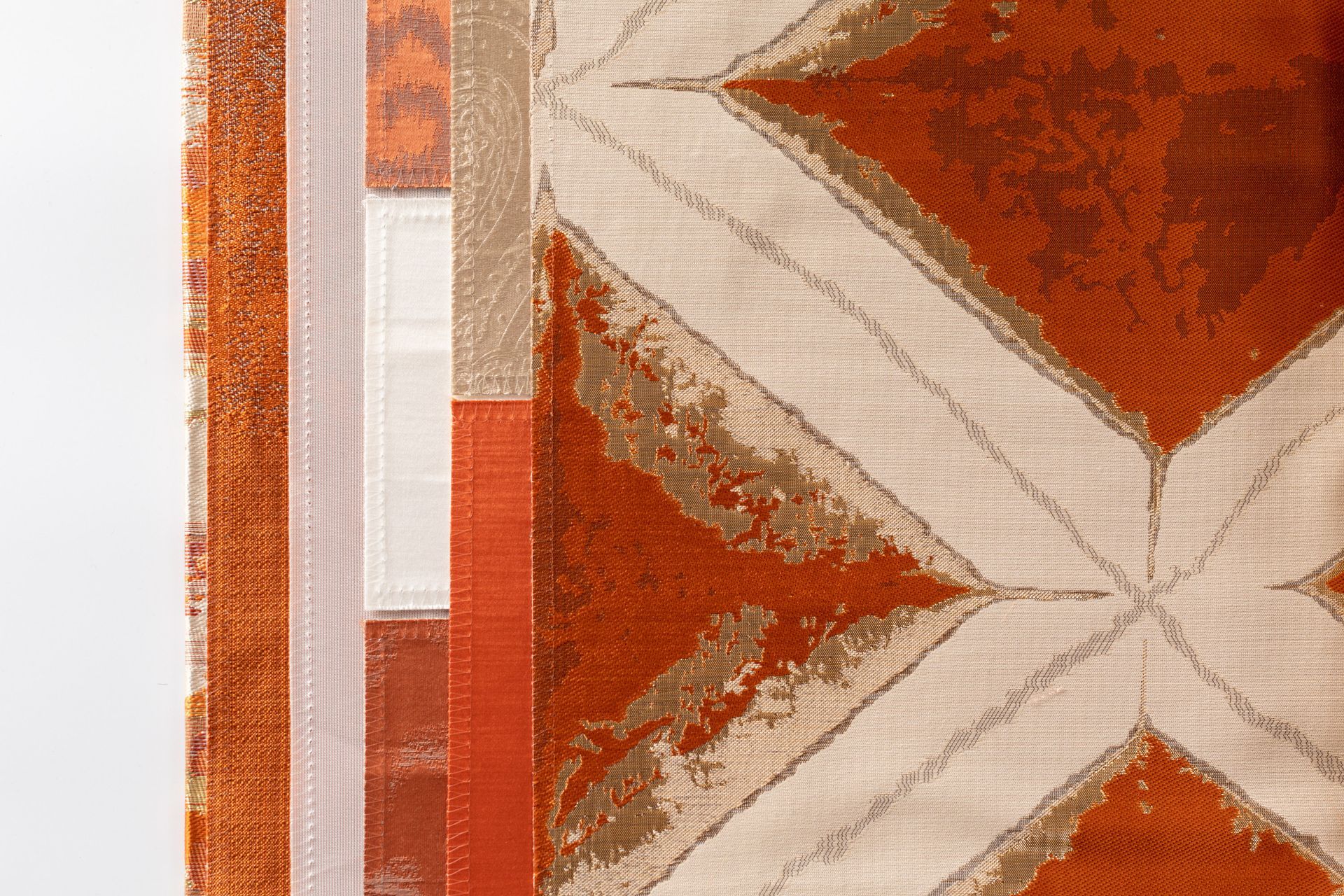 A close up of a rug with a geometric pattern on it.