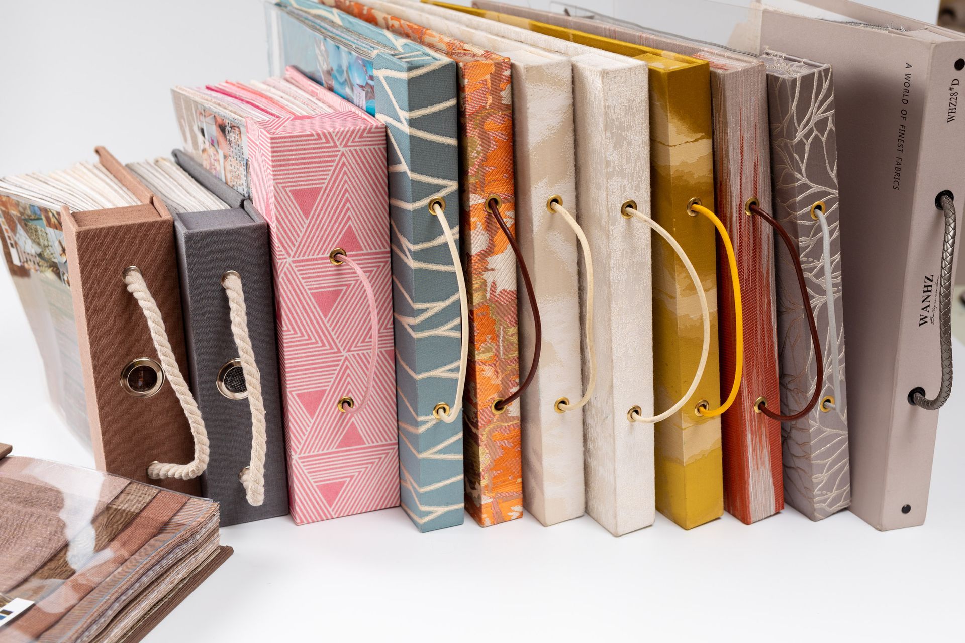 A bunch of books are stacked on top of each other