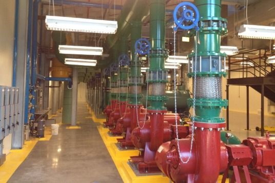 A room filled with lots of pumps and pipes