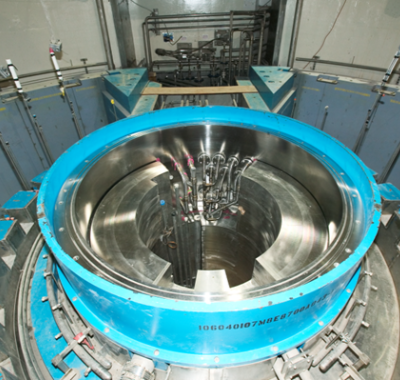 A large stainless steel cylinder with the year 1968 on it
