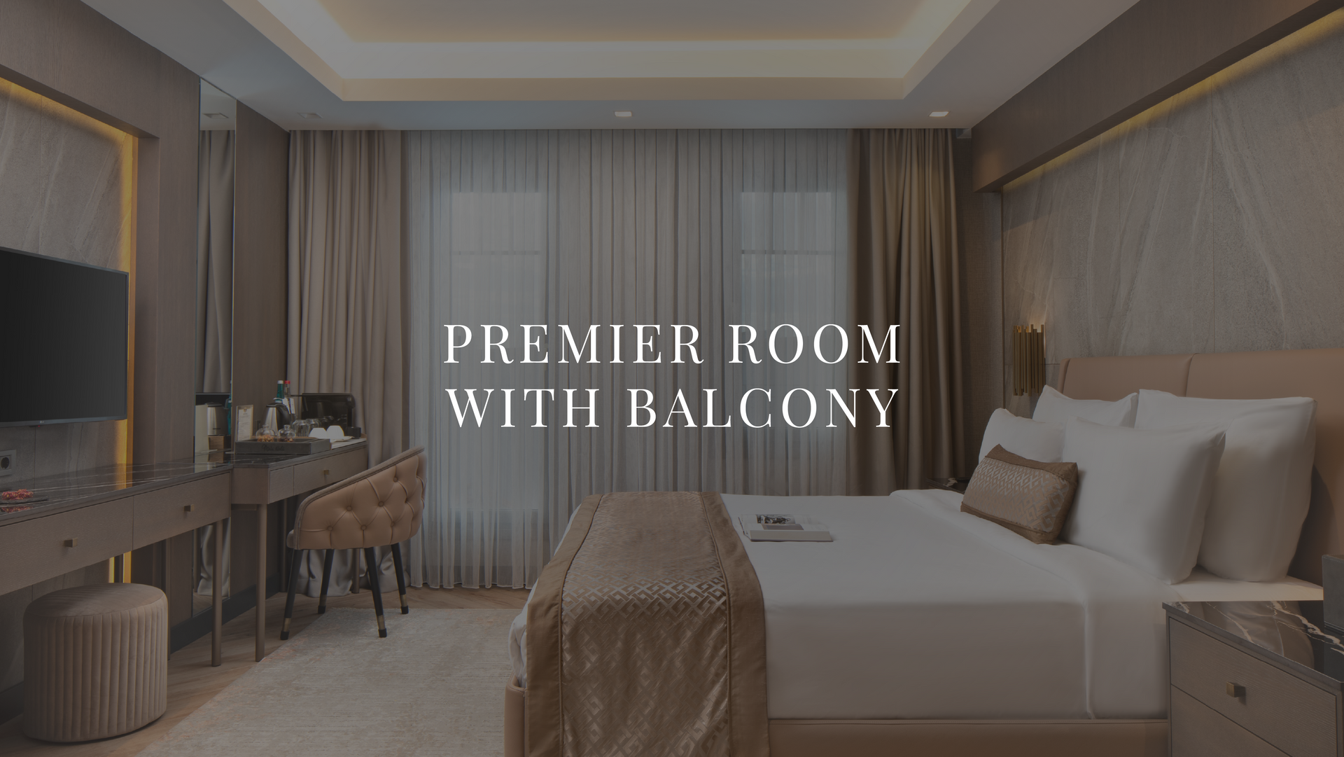 Hotel bedroom with king bed, desk, and balcony doors, overlaid with “Premier Room with Balcony” text | Mula Hotel