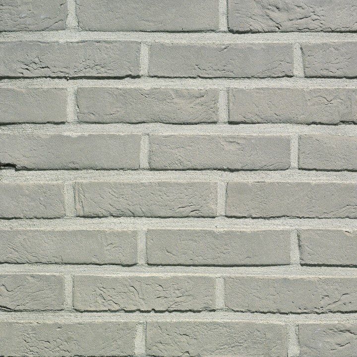 Gray brick wall with light-colored mortar.