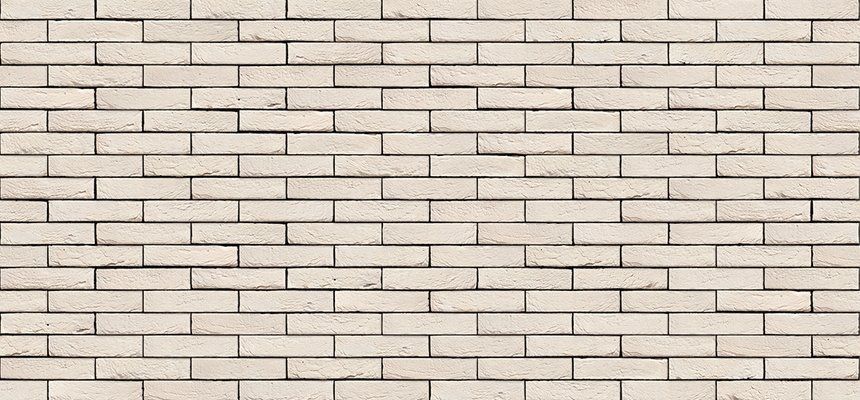 Beige brick wall.