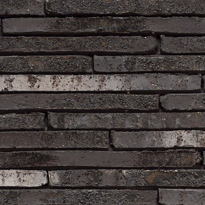 Dark gray and white brick wall texture.