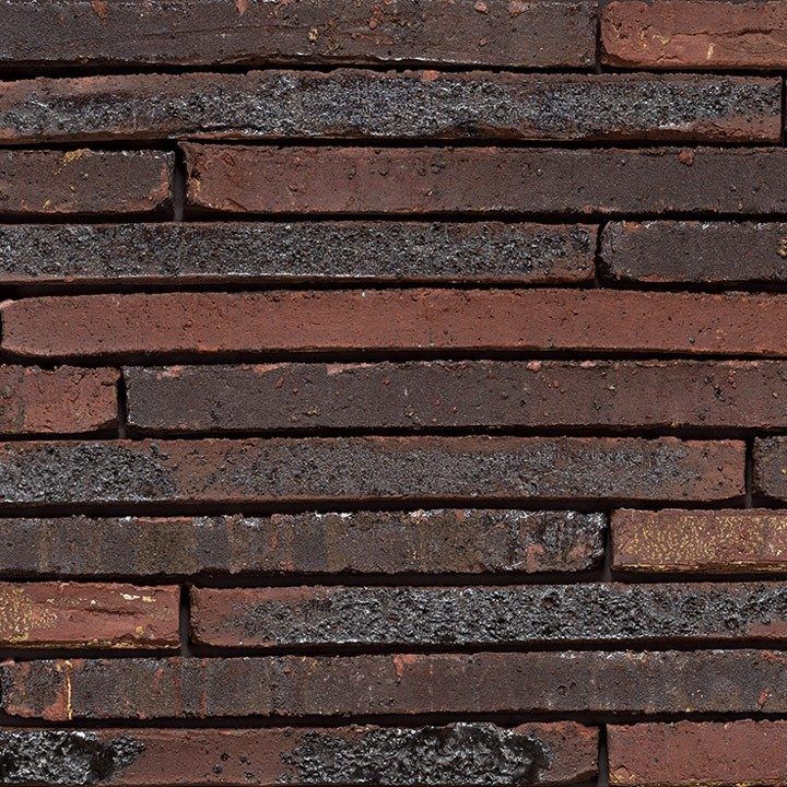 Brick wall texture with horizontal red and dark gray bricks.