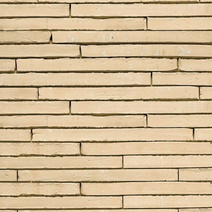 Beige brick wall with horizontal staggered pattern.