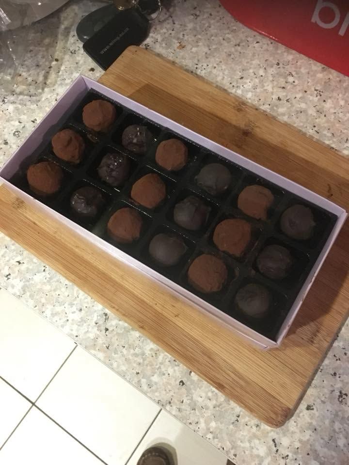 Finished truffles dusted in cocoa powder