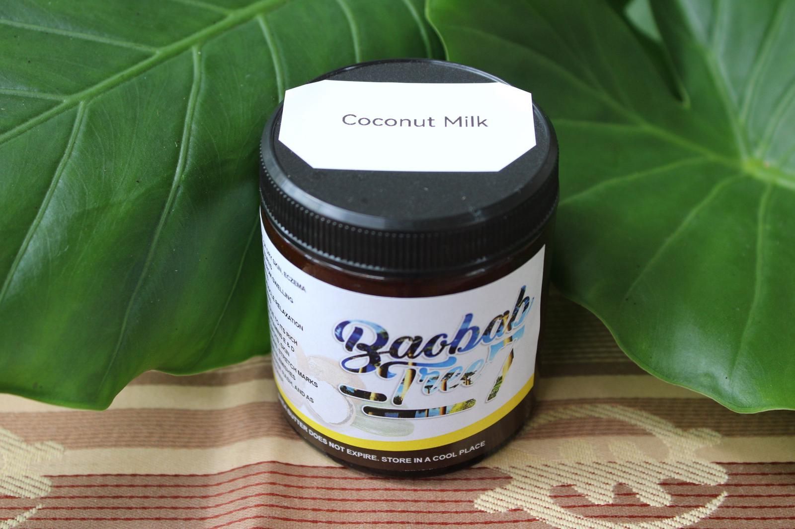Jar of baobab powder labeled “Coconut Milk” on a leaf-patterned background