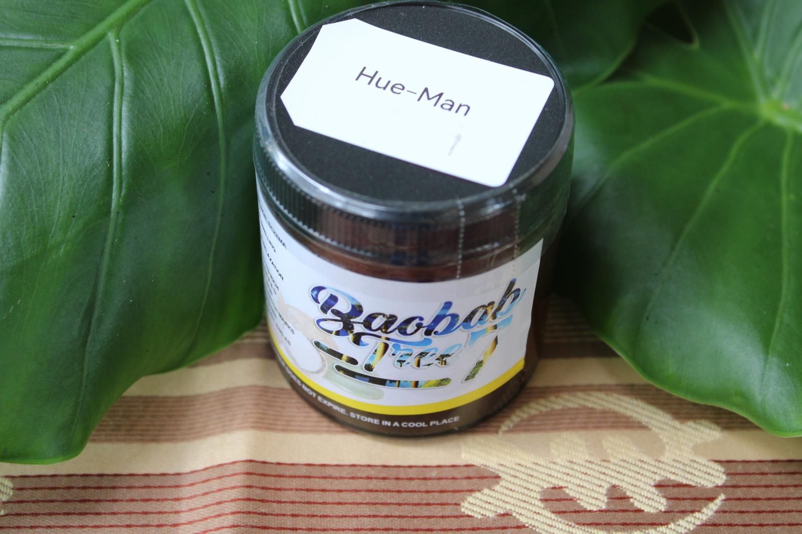Small jar of “Saffa” sauce on green leaves, with a handwritten “Hus-Man” label on the lid.