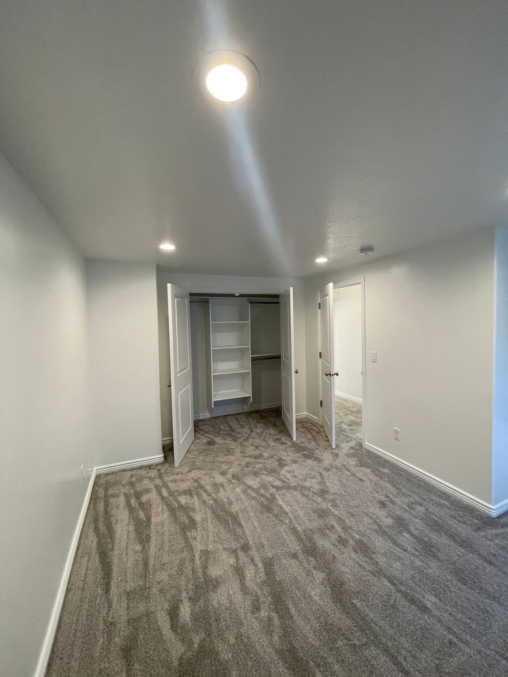 There is a closet in the middle of the room.