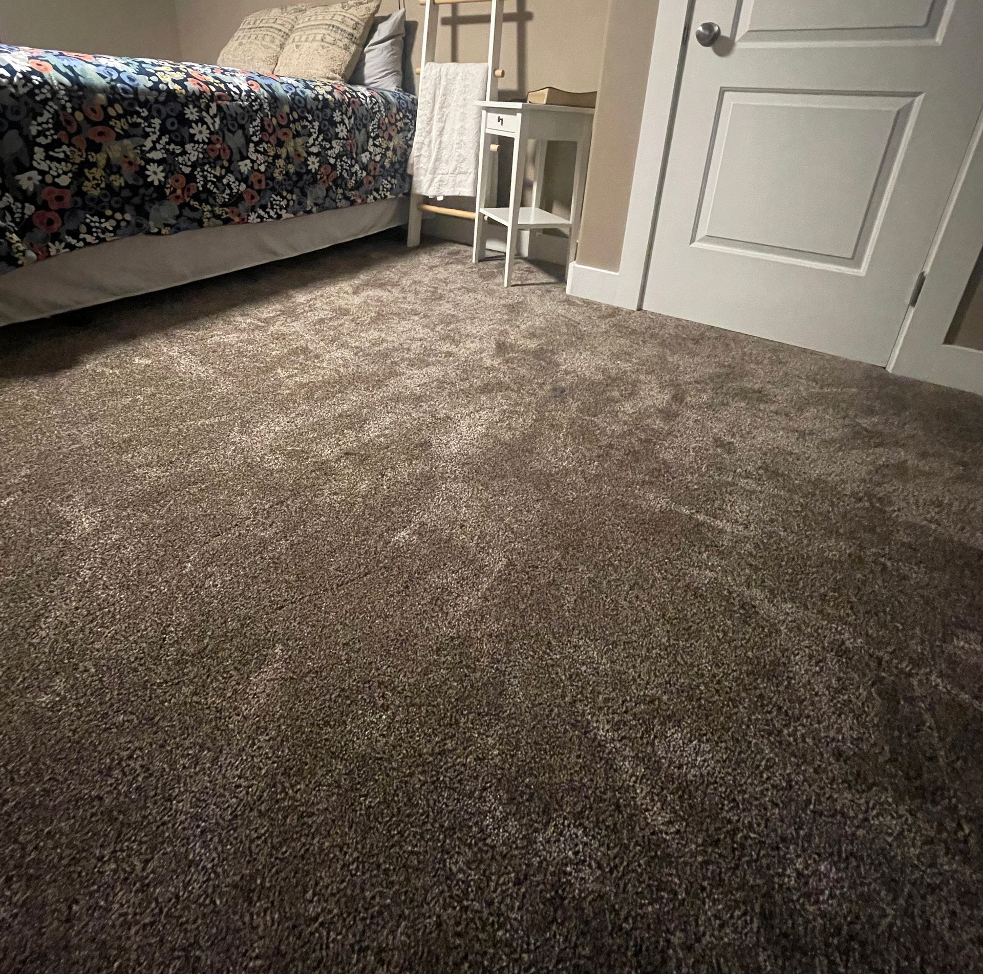Bedroom with new carpet installed by utah's best flooring contractor Elevate Builder