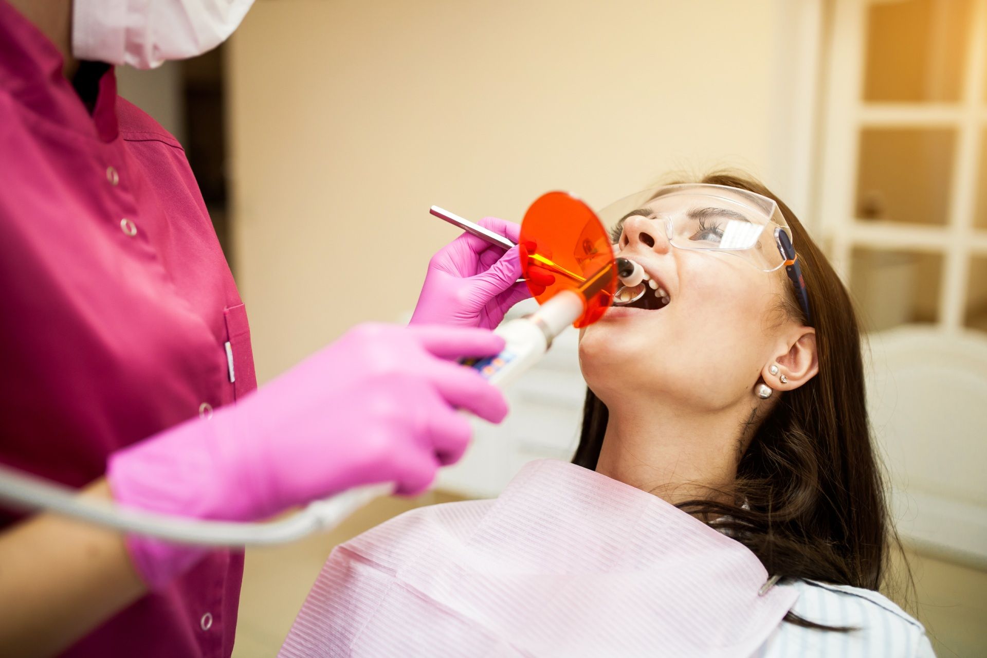 Visit a same-day dentist in Oak Point 75068. Patient taking a dental exam