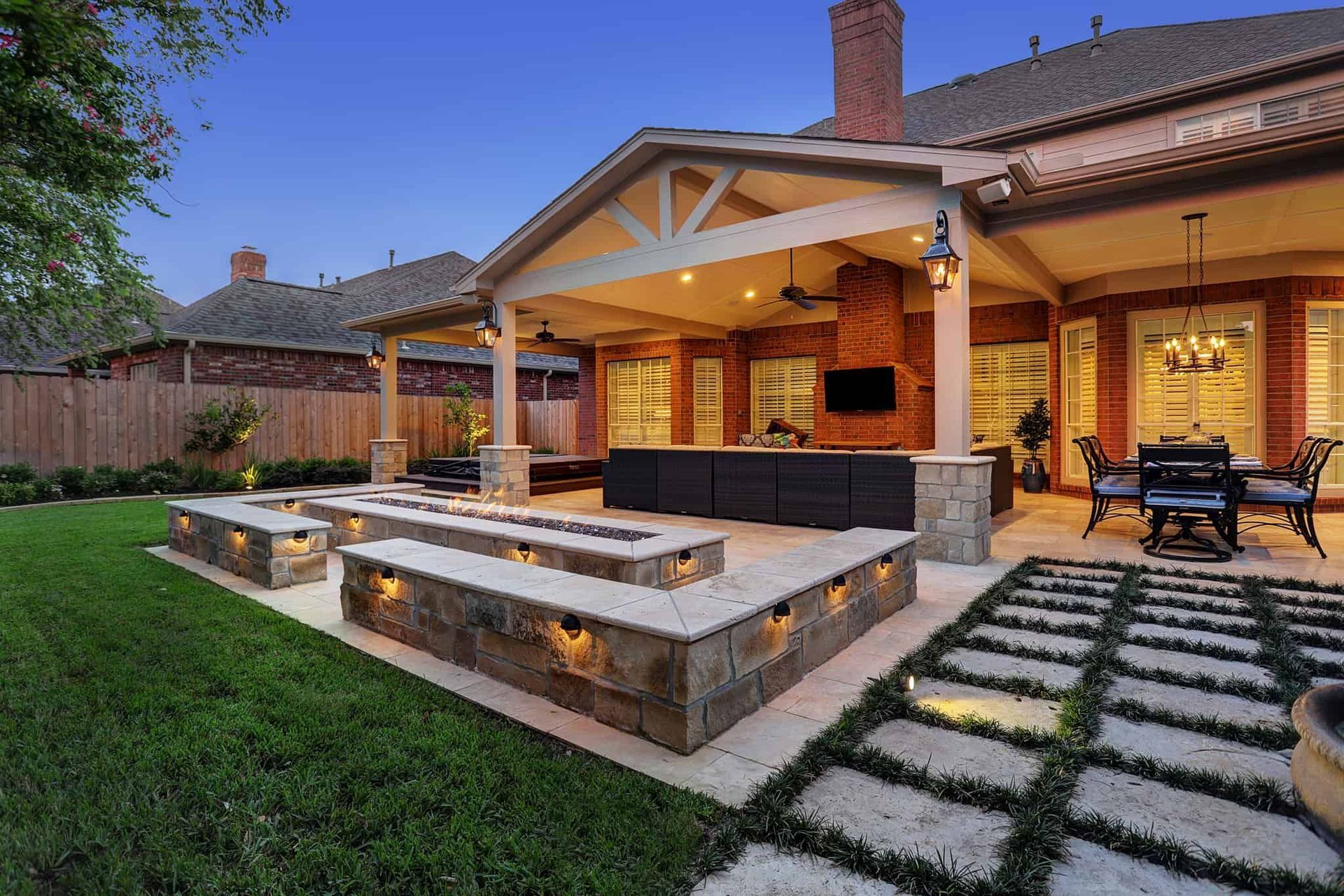Luxury backyard patio with outdoor lighting
