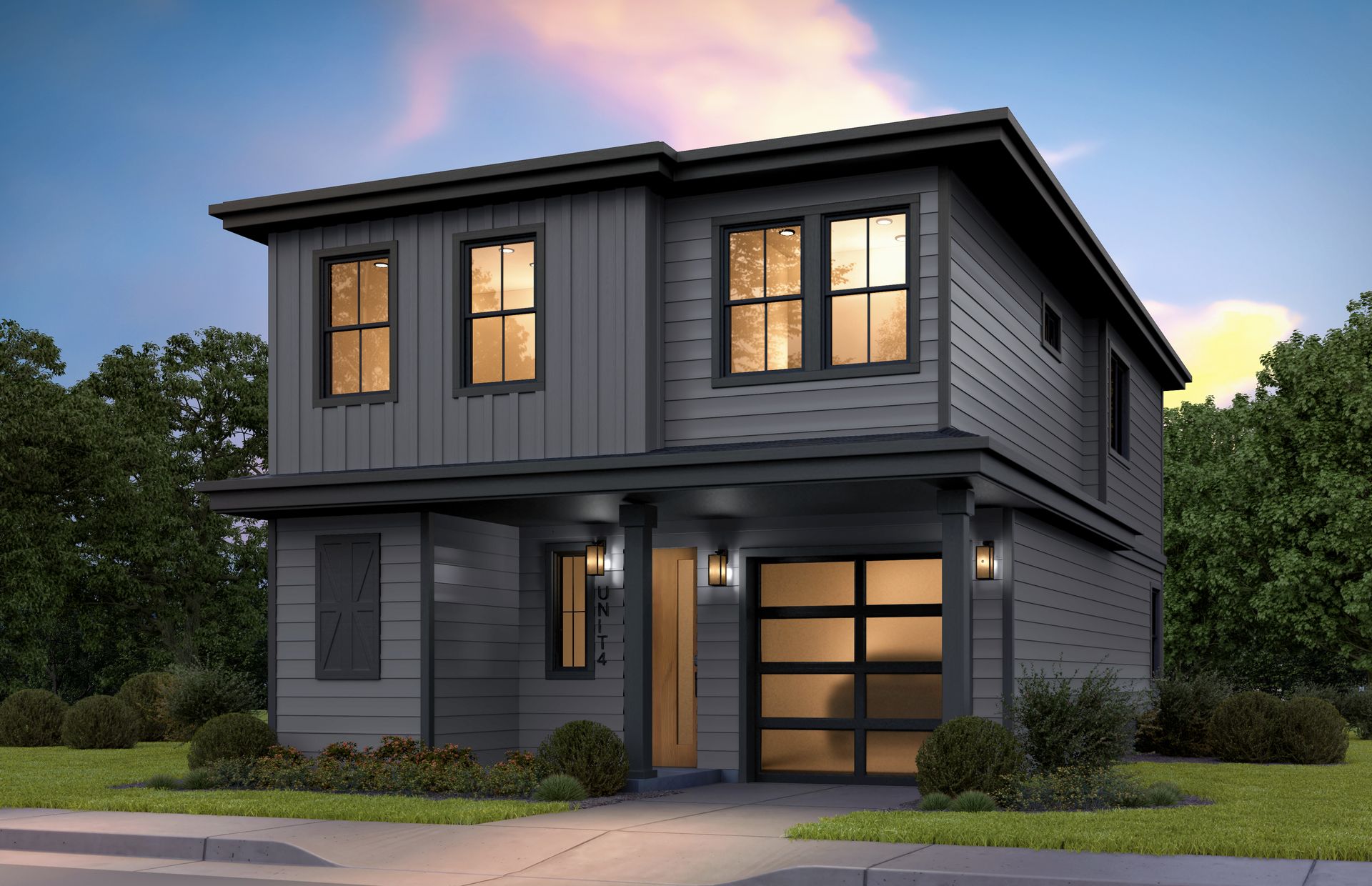 Two-story modern gray house with glass garage door and windows.