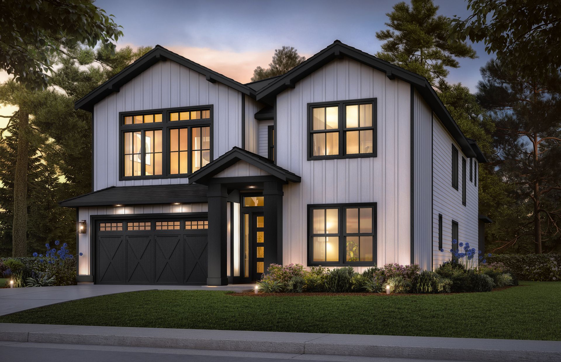 A black and white house with a black garage door