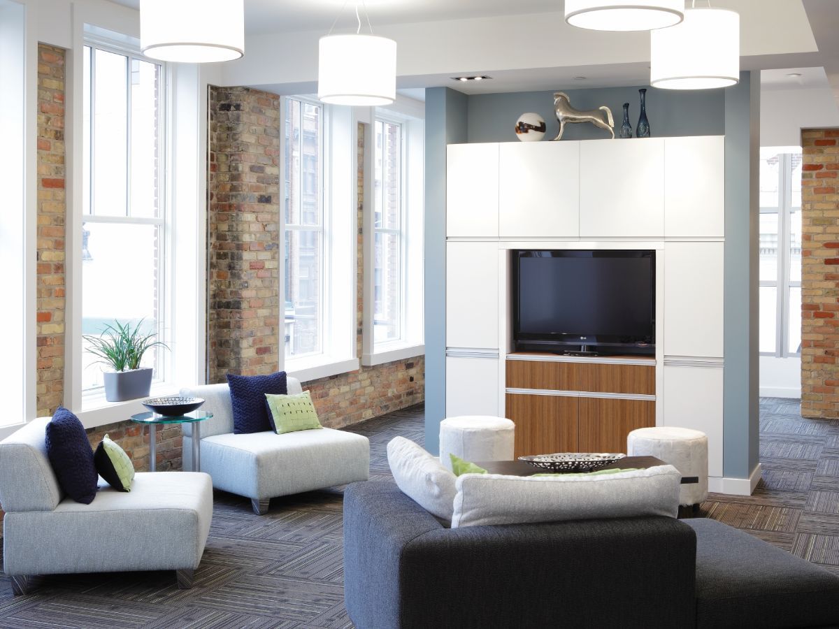 A living room filled with furniture and a flat screen tv
