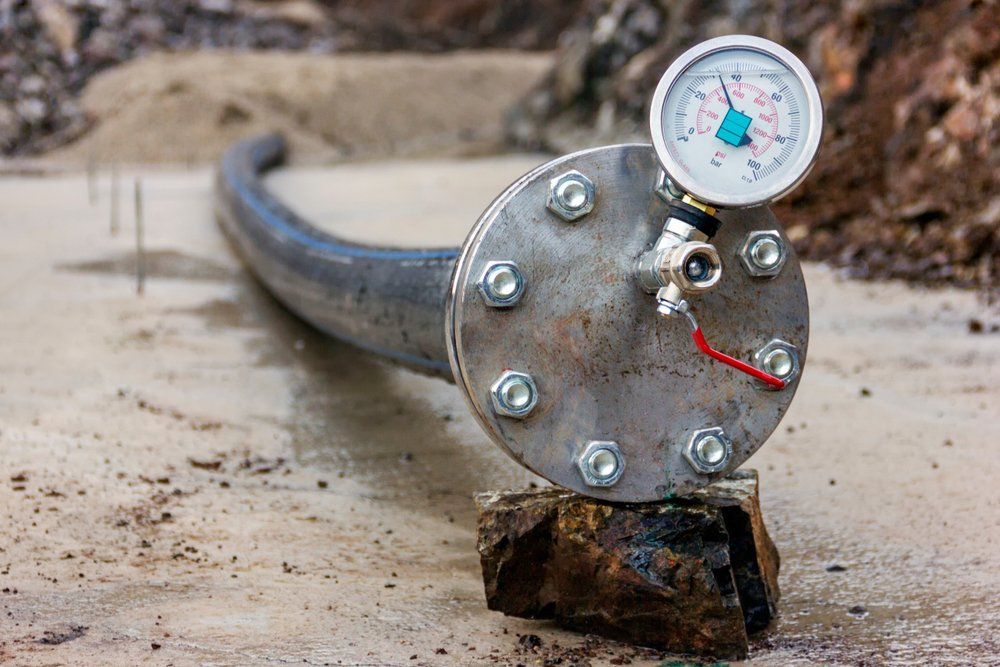 Metal Pipe With Pressure Gauge Attached — Fire Maintenance Services (NT) Pty Ltd in Winnellie, NT