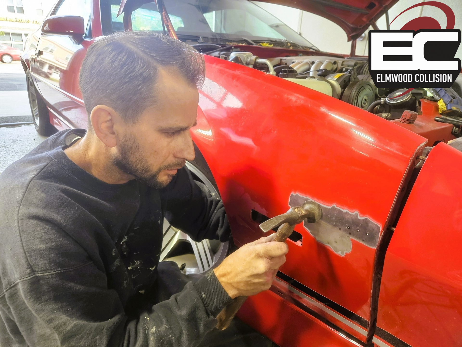 auto body tech working at elmwood collision buffalo ny