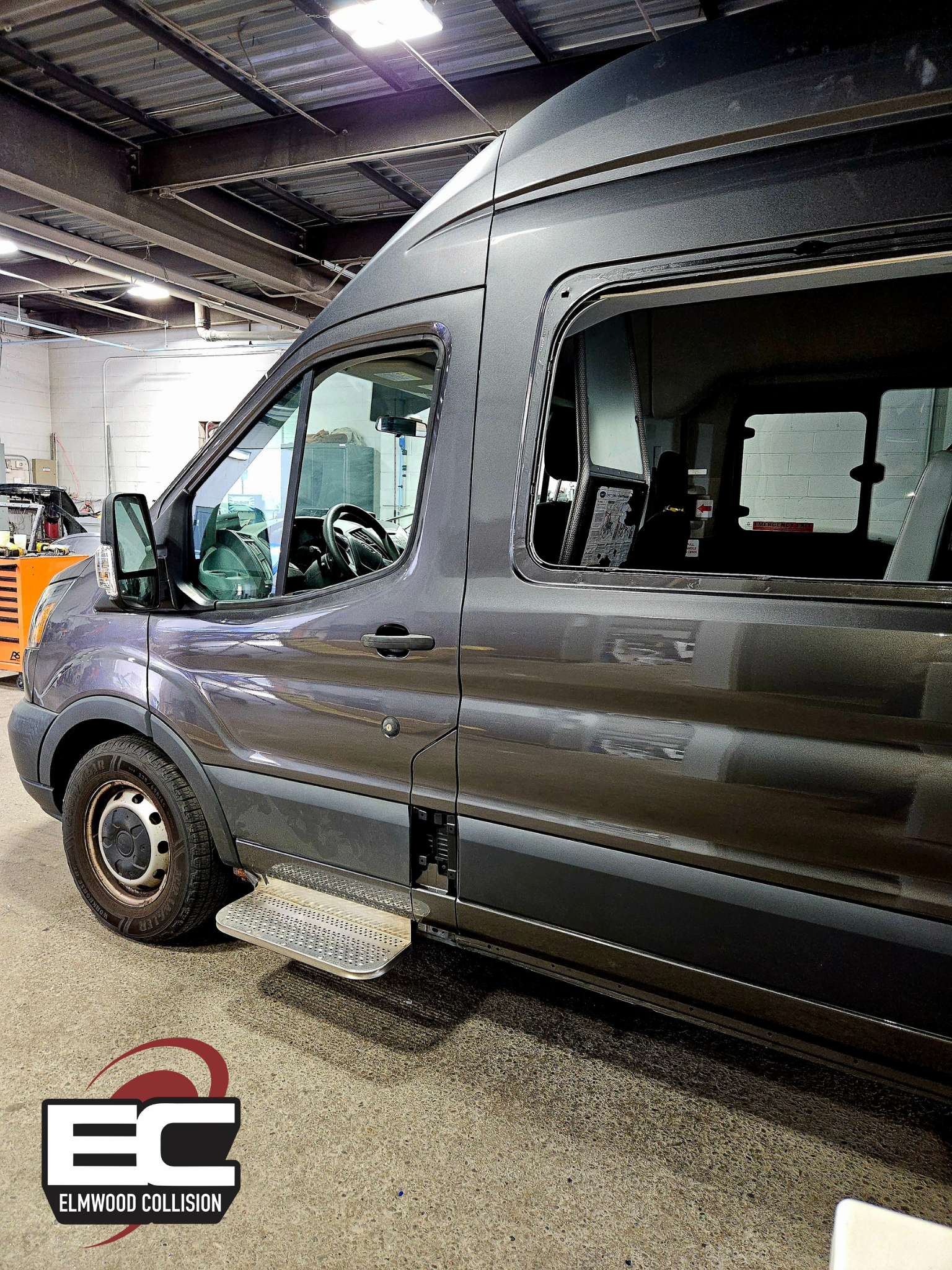 ford passenger van with quarter panel repair completed at elmwood collision near buffalo new york
