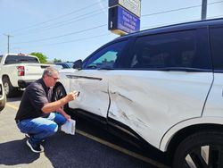 Estimate and inspection of collision damage before auto body repairs begin at Elmwood Collision.